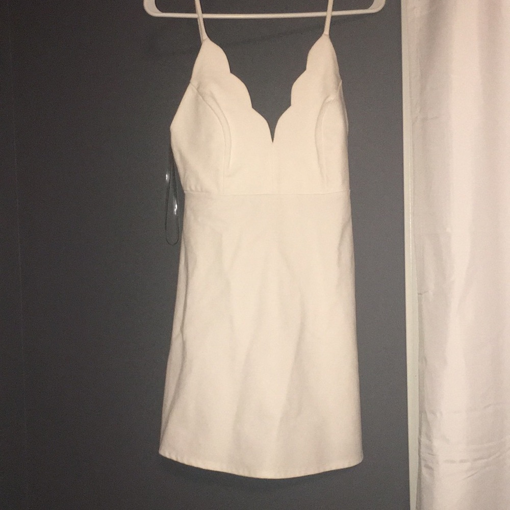 White scalloped dress